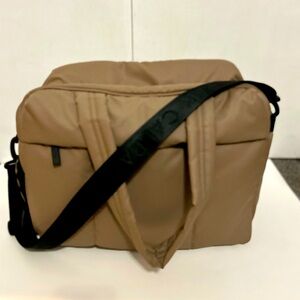 The CALPAK Luka Duffel bag in Chocolate